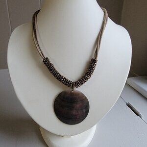 Shell necklace with beadwork and leather rope necklace